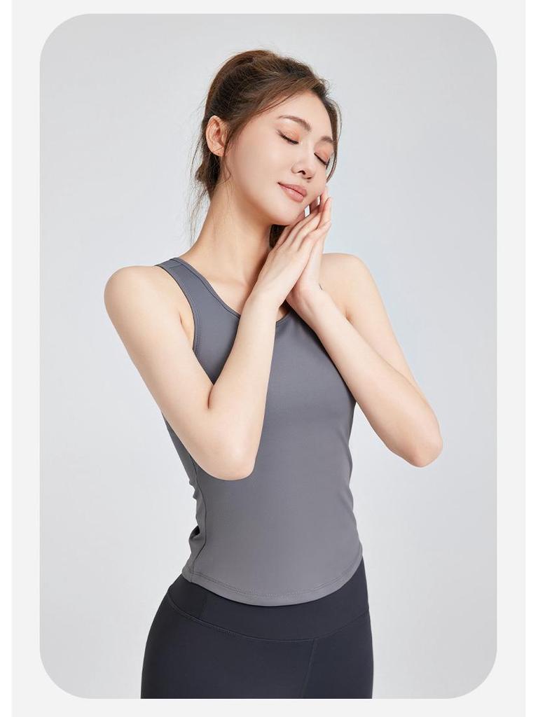 Peach Yoga Tank Top with Built-in Bra: High Elastic, Fixed Cups, Tight-Fitting, Anti-Exposure, Non-Shifting, Round Neck Sports Tank.