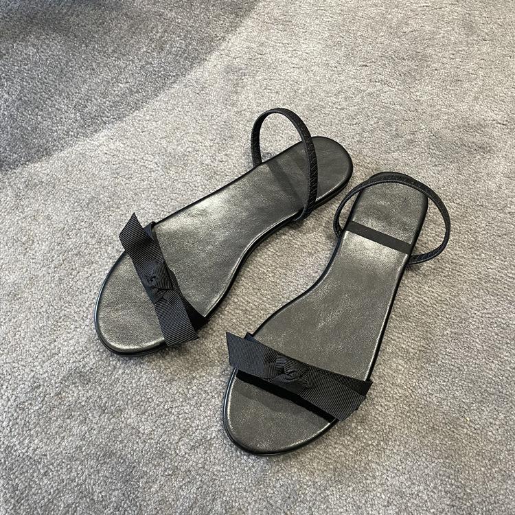 2025 Sommer neue Schleife einfache flache Schuhe mit Sandalen Leder coole Hausschuhe Damenmode