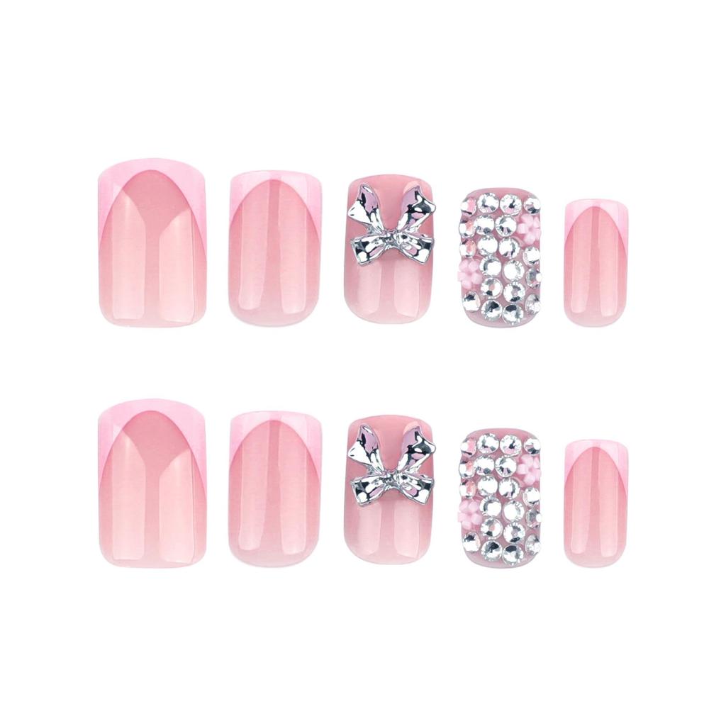 Short Square French Pink False Nails with 3D Metal Bow and Glitter Sparkle Nail Art.