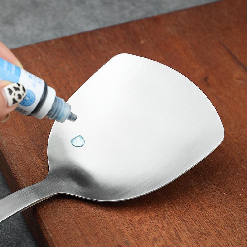 Stainless Steel Kitchen Utensil Set: Spatula, Frying Shovel, Soup Ladle & Slotted Spoon with Anti-Scald Wooden Handles.