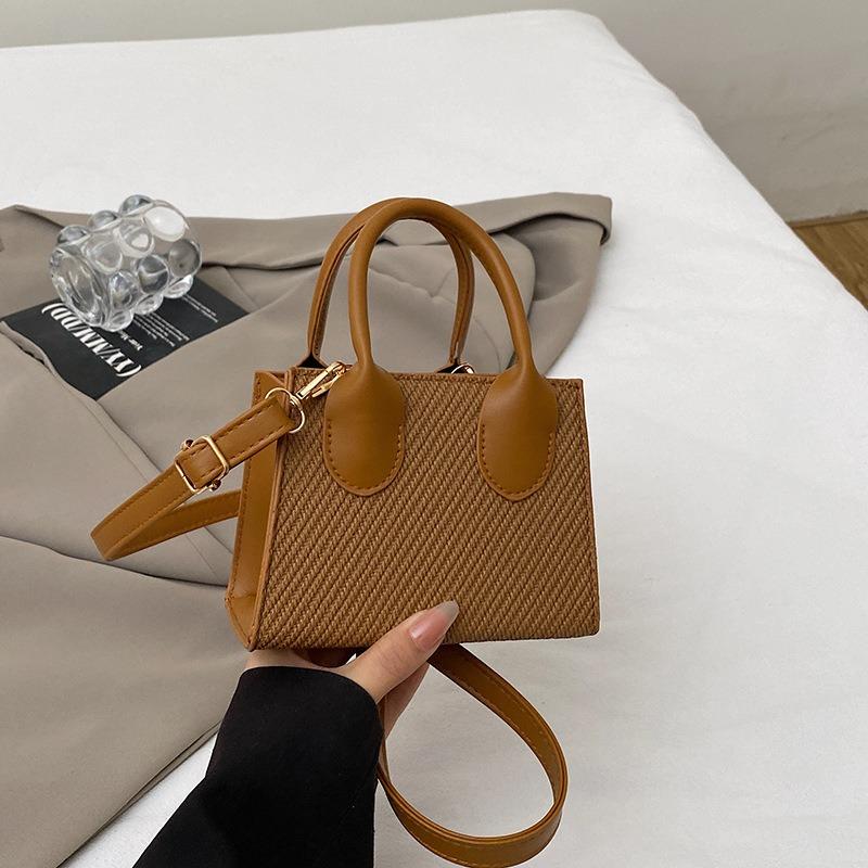 Sommer neue Tasche Damenmode einfache Umhängetasche tragbare kleine quadratische Tasche Damentasche lässige Pendler Umhängetasche