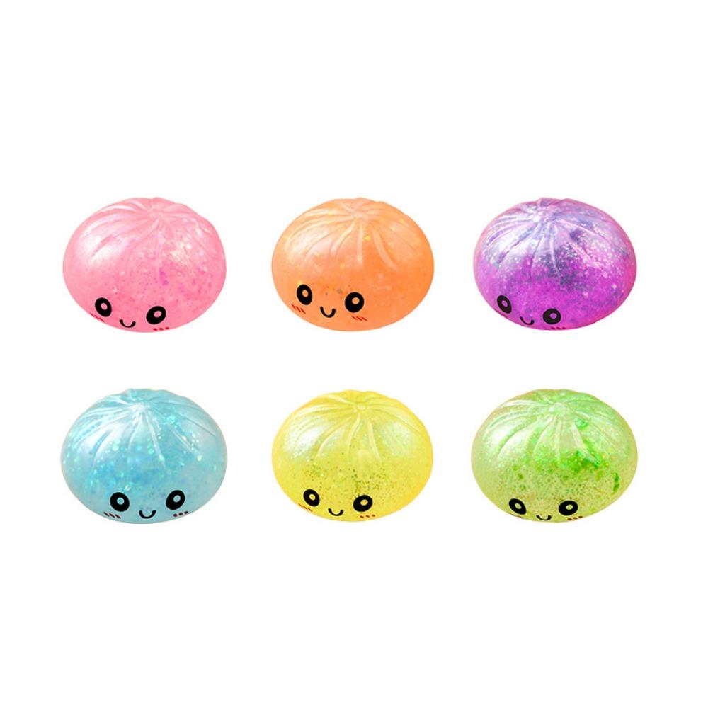 Cartoon Smiley mit Glitzer gefülltes Squishy Brötchen Spielzeug, Langsam zurückfederndes Fruchtmarmeladen-Stressabbau-Brötchen mit Farbkastenverpackung