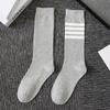 Female Spring and Autumn Four Bar Stripes Thin Pure Cotton College Wind Tall Leg Socks