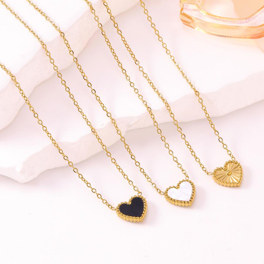 Double-Sided Heart Pendant Necklace: Mother-of-Pearl On One Side, Floral Design On the Other, Stainless Steel Clavicle Chain