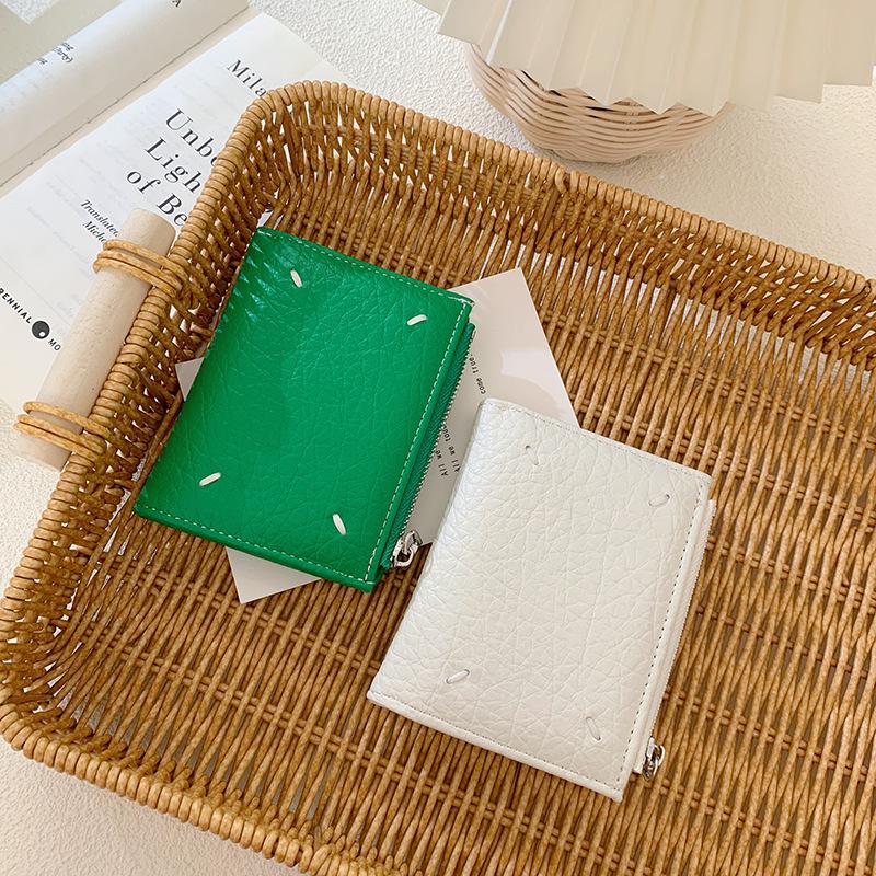 Korean version of women's wallet ins women's small wallet women's high-end short wallet change bag solid color zipper hand-held