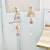 Boucles d'oreilles éventail style ancien Fleur de chat avec pompons asymétriques pour femmes