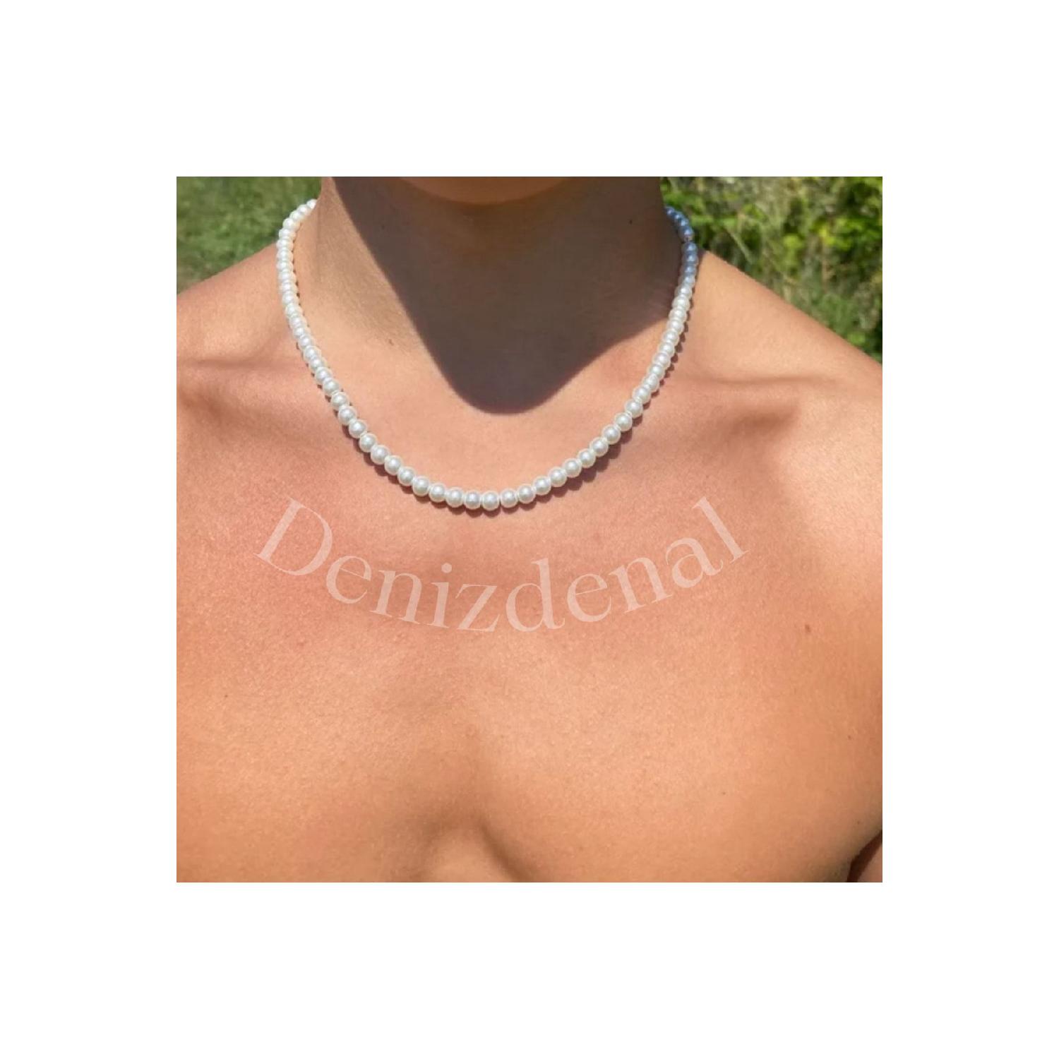 

Unlearned Male Pearl Necklace