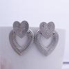 Neue Damenmode Liebe Herzförmige Ohrringe Metall Retro Hohle Doppelherz Ohrringe Schmuck