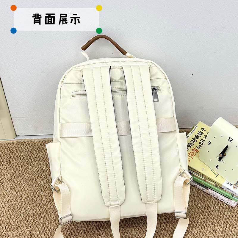 Schoolbag Korean new solid color simple backpack female niche light leisure high sense commuting versatile large capacity backpack