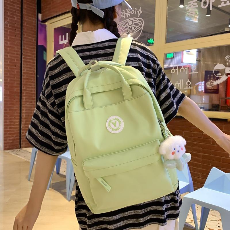 Japanese ins girl backpack Korean version of junior high school student schoolbag female tide large capacity solid color nylon handbag