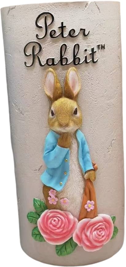 

This bold, hand-painted, gray umbrella stand features a bold rose design from the beloved Peter Rabbit, measuring 14cm in diameter and 30cm in height.