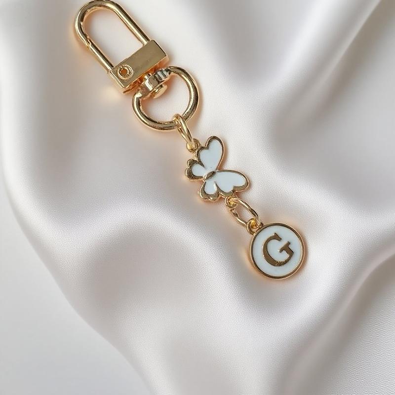 Metalowy Brelok z Literą Motyla A-Z 26 Liter Brelok Urok Uchwyt na Klucze Samochodowe Zawieszka do Torby Akcesoria Biżuteria Prezent