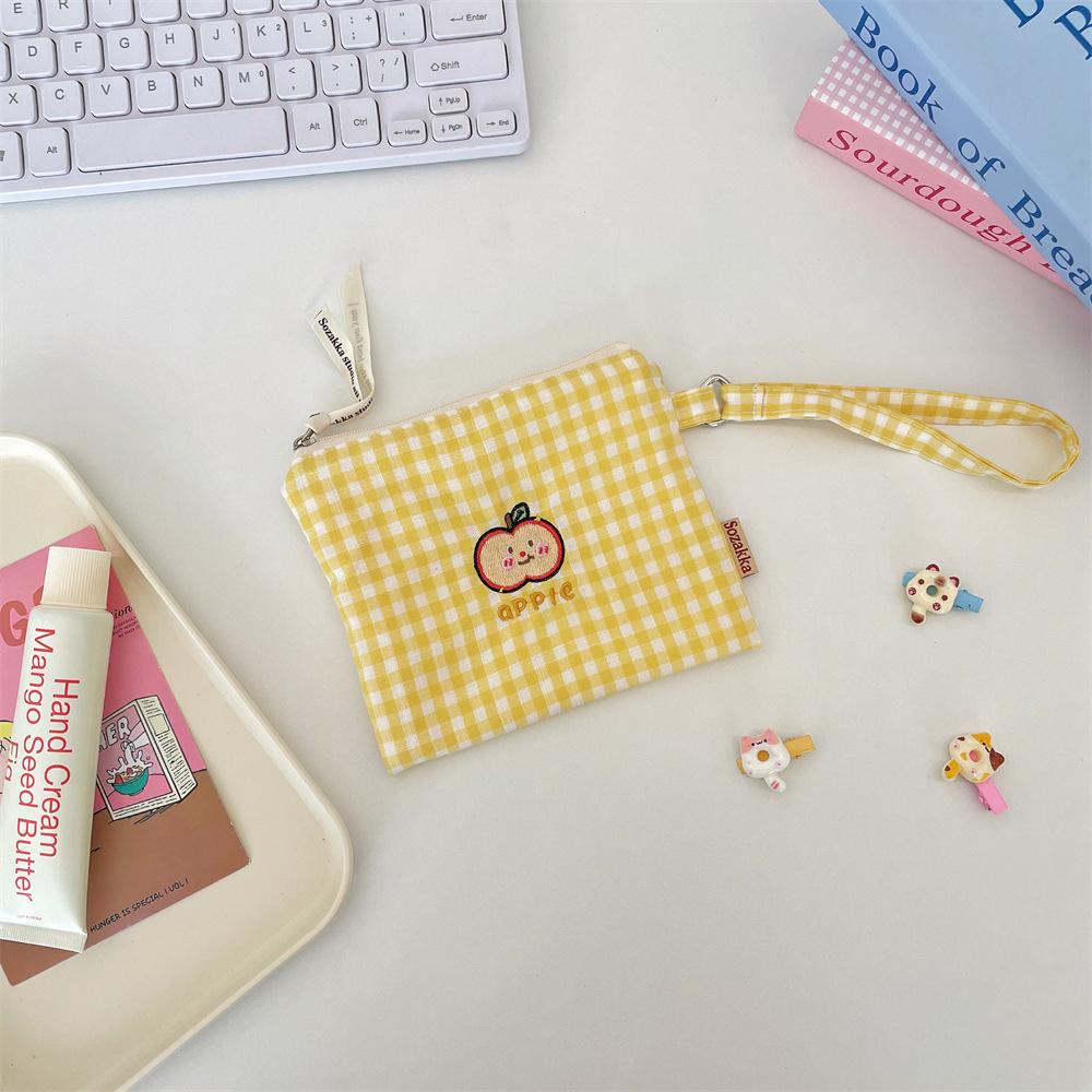 5 Cute embroidery storage bag, change bag, portable earphones, sundries, sorting bag, lipstick jewelry, coin storage.