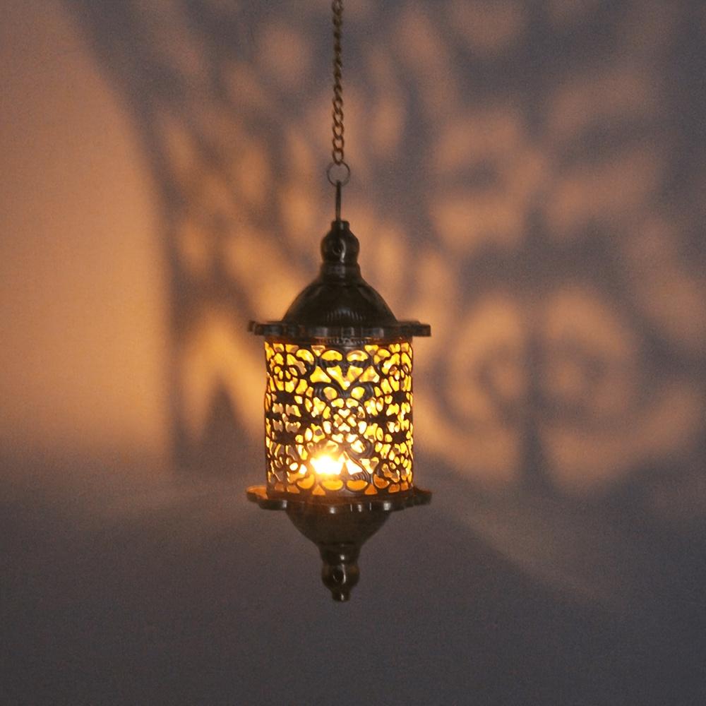1Vintage Hollow Carved Metal Hanging Candle Holder – Moroccan-style iron art light and shadow projection design creates a cozy atmosphere –