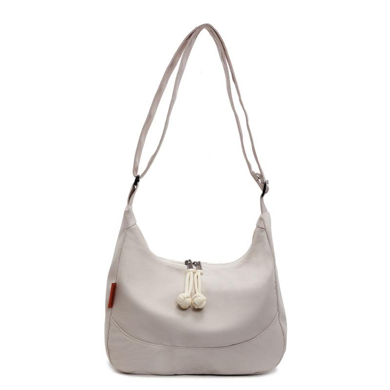 Fashion commuter large-capacity shoulder bag women's 2025 new spring leisure personalized tote bag Korean version of the armpit bag