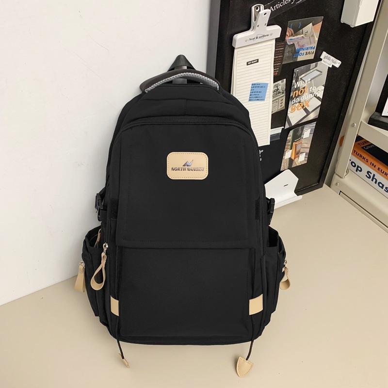 Neuer Rucksack weiblich Mittelschule College-Student Schultasche einfarbig beliebt Rucksack mit großem Fassungsvermögen einfacher modischer Stil