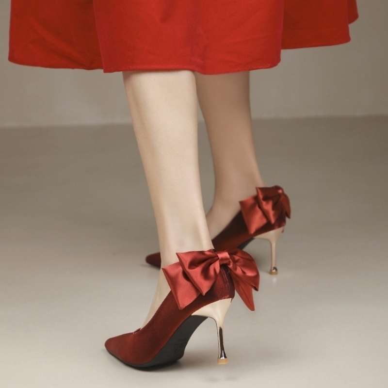 Thin heel red wedding shoes Xiuhe wedding dress two wear white high heels women's niche design sense bow pointed single shoes