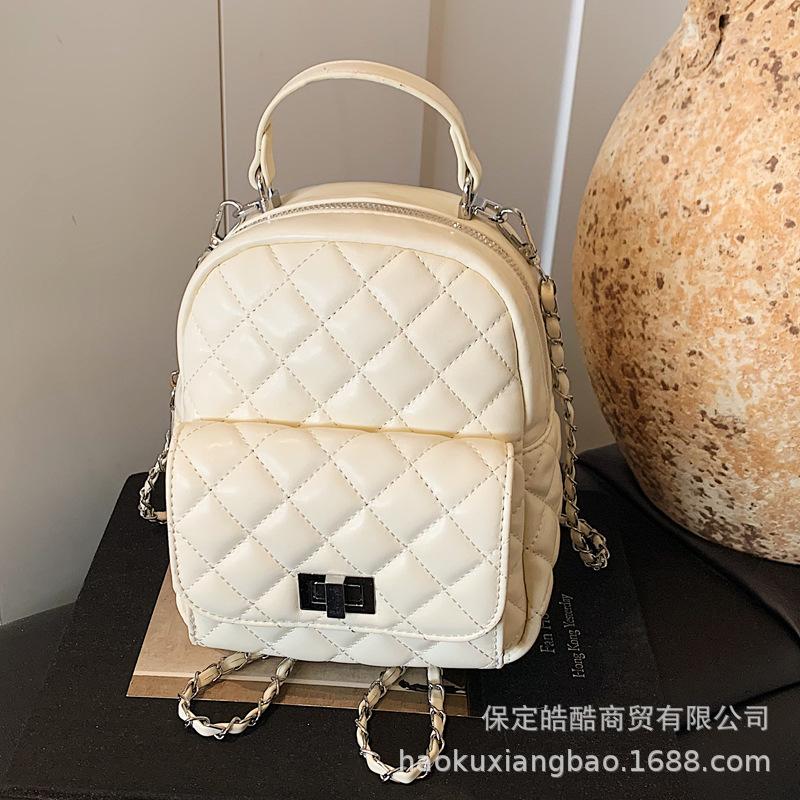 Rhombus chain backpack women's fashion niche design high value Korean version schoolbag high sense mini travel backpack