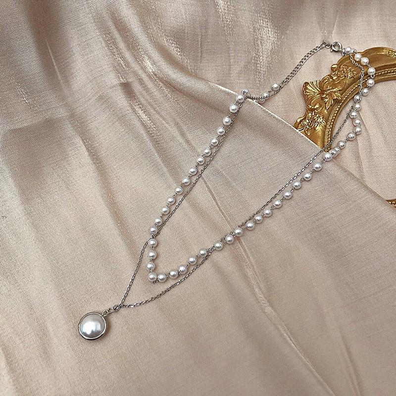 Elegant Silver Pearl Necklace: High-End Design for Women - Versatile and Chic Clavicle Accessory.