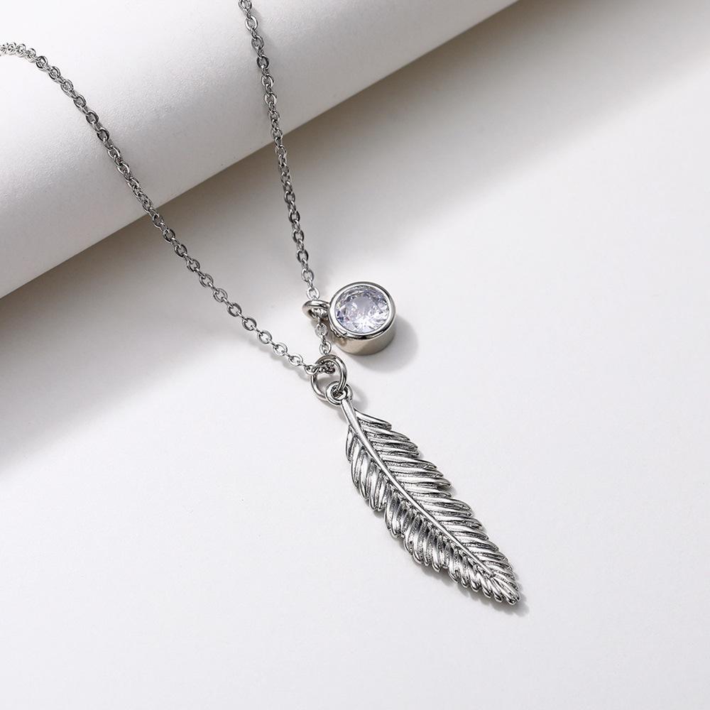 Vintage Feather Pendant Necklace with Sparkling Round Stone Accent Elegant Nature Inspired Jewelry for Women