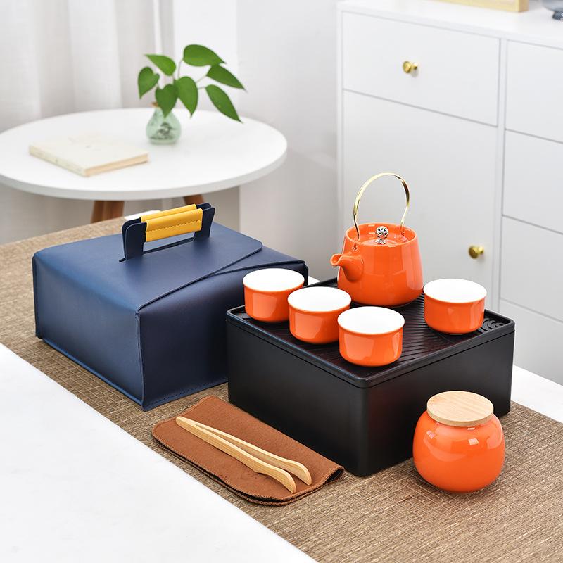 

Creative ceramic travel tea set cover, cover bowl, cool pot, one pot, four cups, tea tray storage bag, business gift.