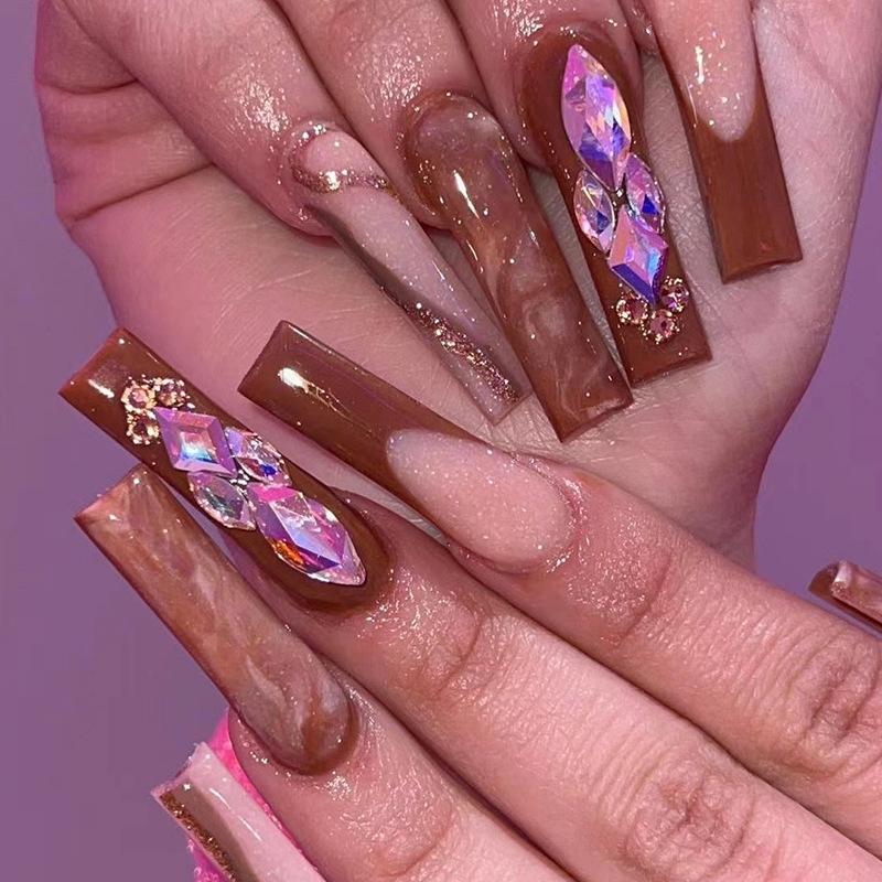 Wear nail pads, long ballet rhinestones, smudge nail pads, finished nail art, wear nail art advanced nail pads