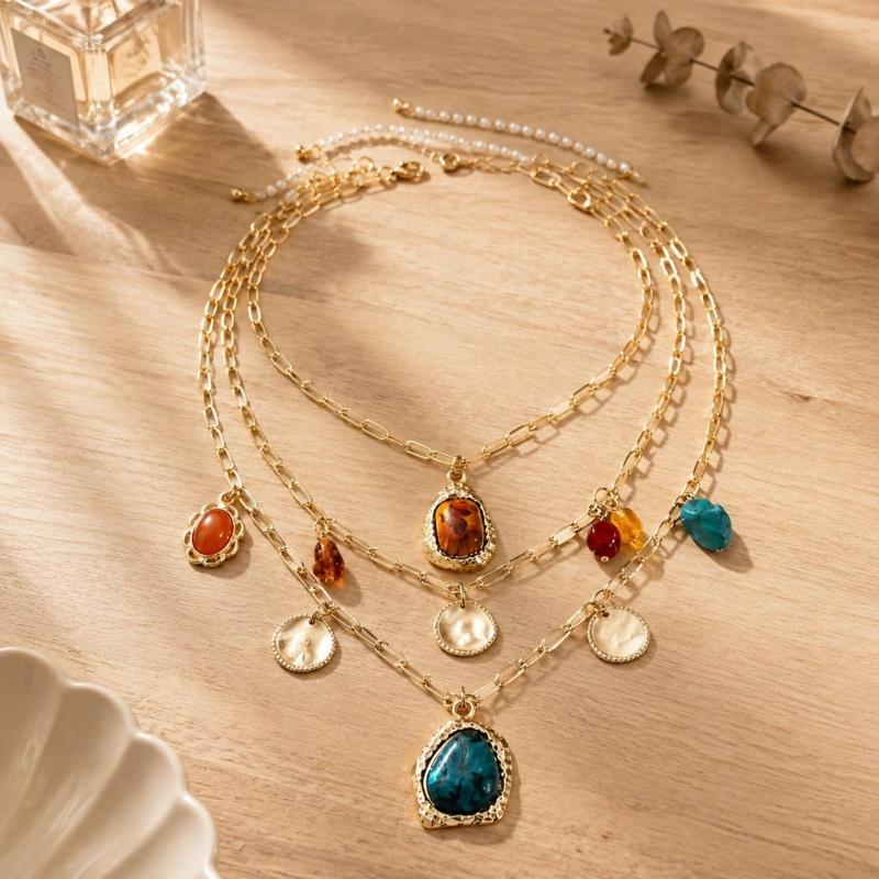 Multicolor Pendant Necklace with Assorted Marbled Resin Shapes, Bead Details and Gold-Tone Chains in Coordinated Multi-Strand Design