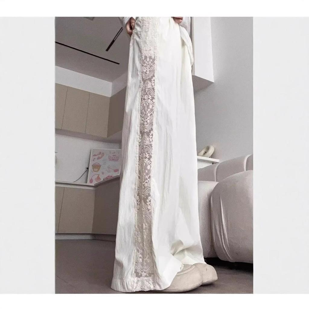 Pantaloni a gamba larga traforati con inserti in pizzo da donna estivi a vita alta con senso del design larghi sottili drappeggiati casual