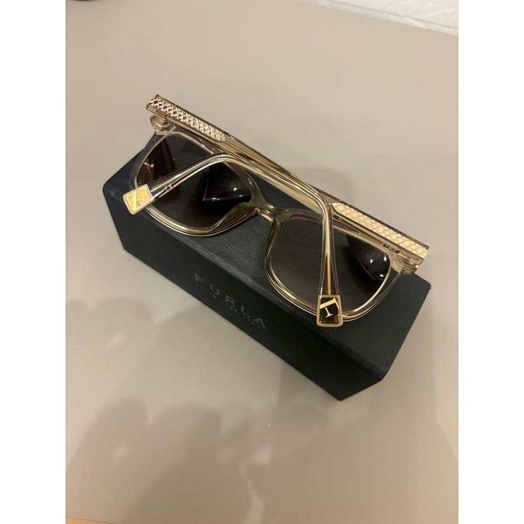 Used FURLA SFU336 clear sunglasses