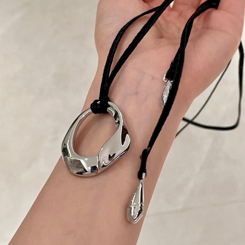 

Женское черное ожерелье с подвеской из веревки - Металлический круг Дун Цзе, Длинная цепочка для свитера, Винтажный роскошный стиль