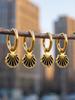 European Stainless Steel Shell Pendant Earrings: 18K Gold-Plated Fashionable High-End Ear Cuffs