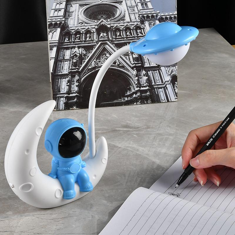 Astronaut LED Night Light: Moon Man Bedside Lamp for Student Dorms, Reading, and Desk Atmosphere.