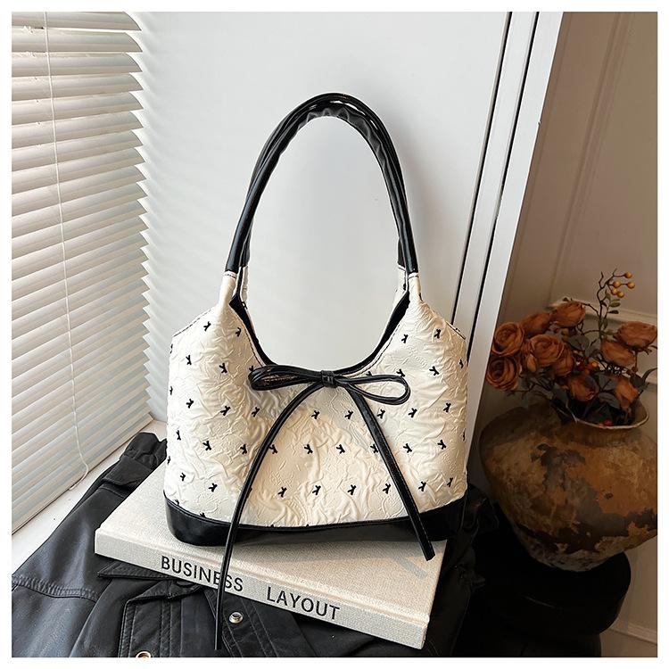 

Сумка-ведро женская сумка 2025 новая летняя сумка на плечо с бантом литературная и повседневная портативная сумка-тоут Tongkan