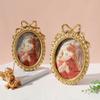 Handcrafted Antique Gold Carving Oval Bowknot Picture Frame With Hanging Hook And Stand For Wall Or Desktop Decoration
