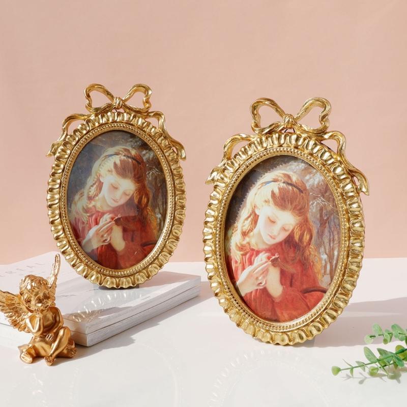 Handcrafted Antique Gold Carving Oval Bowknot Picture Frame With Hanging Hook And Stand For Wall Or Desktop Decoration