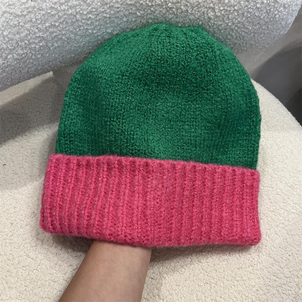 Simple two-color splicing wool hat women's autumn and winter warm niche versatile ear protection hat large version knitted pullover hat tide