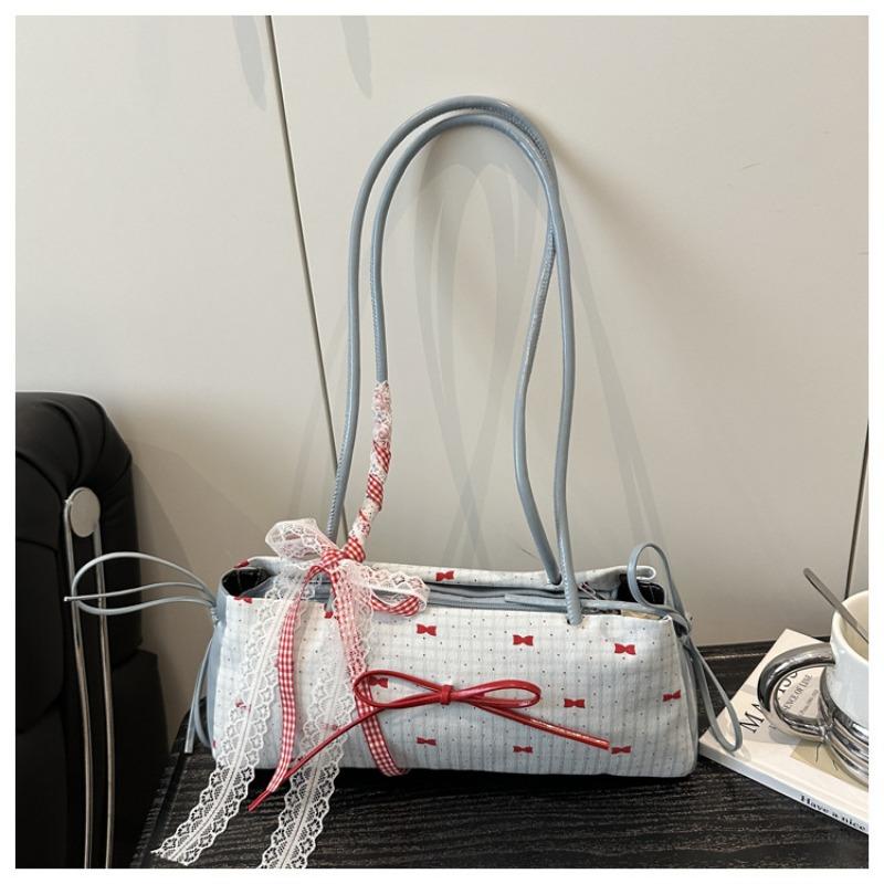 

New trendy fashion polka dot women s niche one-shoulder handbag sweet bow underarm small bag синій