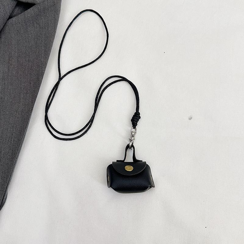 This year, it is super popular. Leather earphones, bags, neck hanging, hand carrying women's mini storage accessories, small bags, pendant keychains.