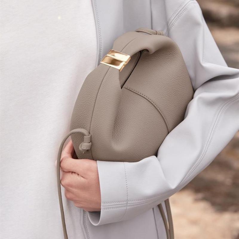 Europeisk amerikansk retro håndveske for kvinner 2024 vår og sommer New Lady Bøtteveske Høykvalitets PU tøyveske Kan håndholdt crossbody og enkelt skulder