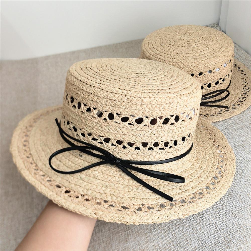 Women Raffia hat French style Summer Straw Sun Hat Women Wide Brim Beach Cap Breathable Hollow Holiday Panama hat Leather Bow