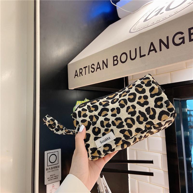 Оптовая женская косметичка-клатч с геометрическим узором и дизайном с цветовыми блоками жёлтый