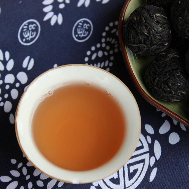 Jing Mai Zi Juan Long Zhu Pu-erh Tee Tuo 250g Roher Puer Tee Pu'er Lila Blatt
