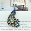 High-End Enamel Brooch: Retro Phoenix Perching on Wutong Tree, Perfect for Women's Cheongsam and Suit Accessories in Ancient Style.