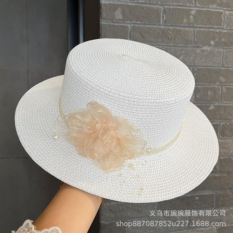 Pearl flower sunshade woven straw hat women's summer seaside vacation sun hat new flat-top sunscreen beach hat