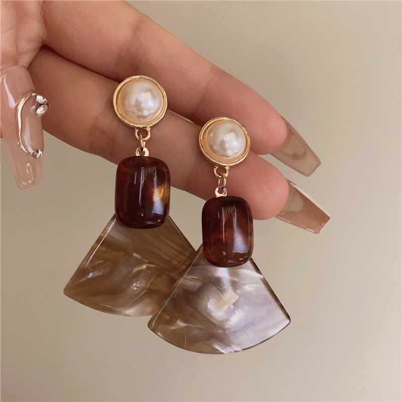 Silver Needle High-End Tassel Earrings – Elegant, Fashionable, Simple Design with a Unique Touch.
