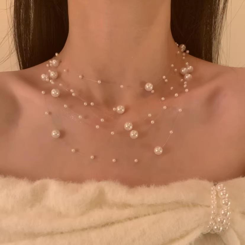 Elegant Stacked Pearl Necklace for Women - High-End Autumn/Winter Accessory with a Stylish Sweater Chain Design