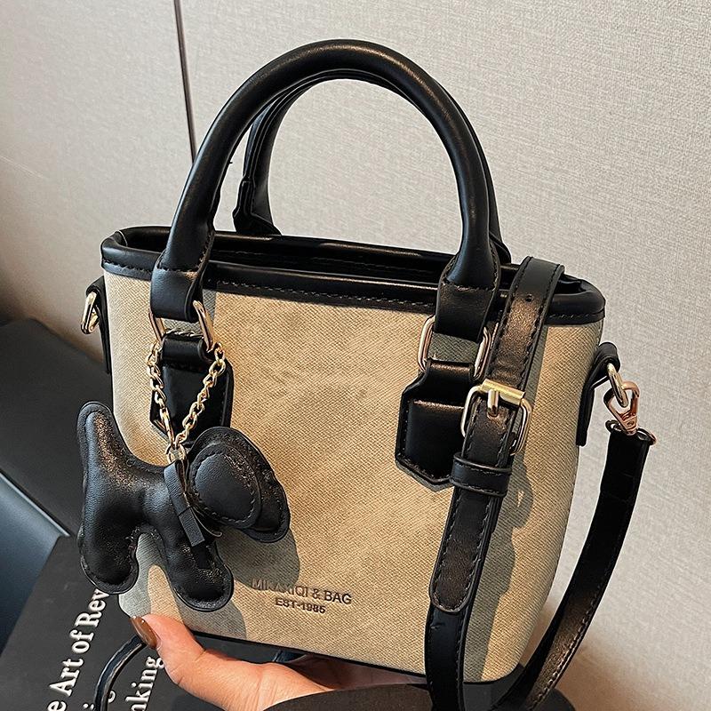 Textur trendige Nischentasche Herbst neu retro Schulter Umhängetasche Mode tragbare Eimertasche Damen