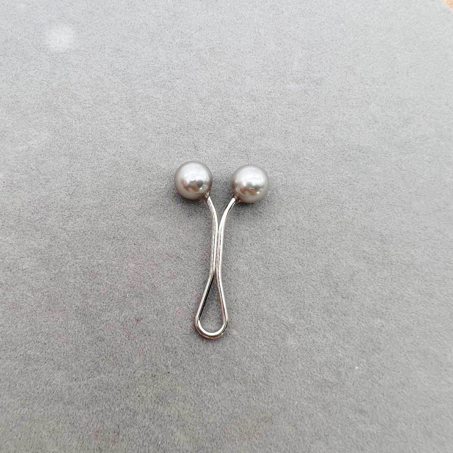 

Затискач для вкорочення рукава футболки – аксесуар для фіксації, що не пришивається сірий