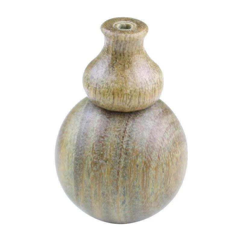 Armband aus grübem Ebenholz und rotem Sandelholz mit Buddha-Kopf, Kürbisanhänger und Vajra Bodhi-Accessoires.