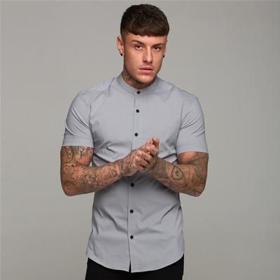 Muscleguys New Arrivals Summer Man Short Sleeve Shirt Solid Fitness Mens Stand Collar Super Slim Fit Business Dress Shirt Button Gym Tops